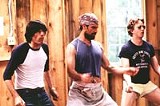 USA FILMS - A campy camp film: Michael Showalter, Christopher Meloni, and A.D. Miles in Wet Hot American Summer.