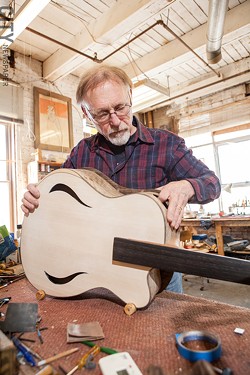 Bernie Lehmann working on a guitar. - PHOTO BY JOHN SCHLIA