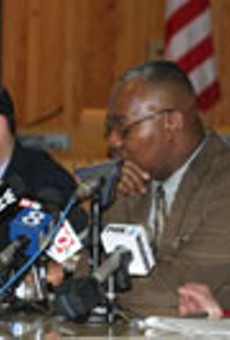 Closing time: school-closure committee members Charles Zettek, Clifford Florence, and Jana Carlisle at Wednesdays press conference.