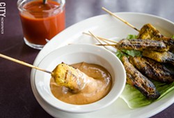 Combination Satay (Chicken and Beef Skewers with Peanut Sauce) from Esan Thai. - PHOTO BY MARK CHAMBERLIN