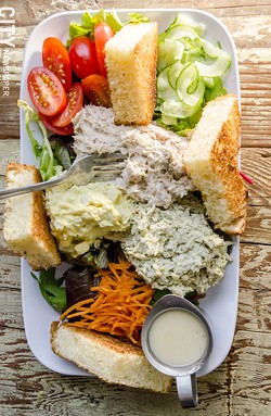Egg salad, basil chicken salad, and tuna salad on mixed greens with toast points. - PHOTO BY MARK CHAMBERLIN