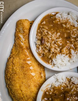 Fried haddock, rice, and pork gravy  from Unkl Moe's - PHOTO BY MARK CHAMBERLIN