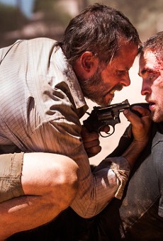 Guy Pearce and Robert Pattinson in “The Rover.”