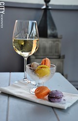 PHOTO BY MATT DETURCK - In addition to a deep wine list, Veritas Wine Bar serves light fare, including French macarons from Pittsford Dairy (pictured).