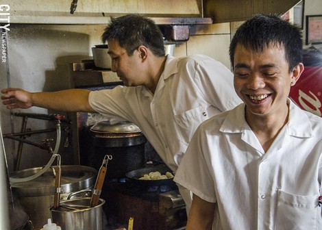 Inside the kitchen at Han Noodle Bar. - PHOTO BY MARK CHAMBERLIN