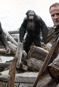 Jason Clarke and some damn dirty apes from "Dawn of the Planet of the Apes."