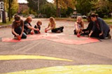 FILE PHOTO - Neighborhood of the Arts' 2013 street painting party.