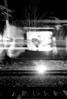 One
    of Frank Menair's untitled still images from his "Project-O-Train."