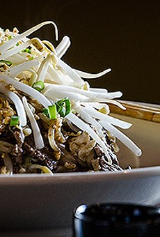 Pad Thai beef with traditional Thai noodles, peanuts, sprouts, eggs & scallions from Papaya.