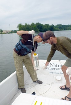Researchers with the Nature Conservancy collected samples of Erie Canal water to test for invasive species DNA. This photo is from last year's collection efforts.