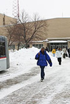 Students at East High School head home. The Rochester school district is considering adding junior-high classes to most of its senior highs.