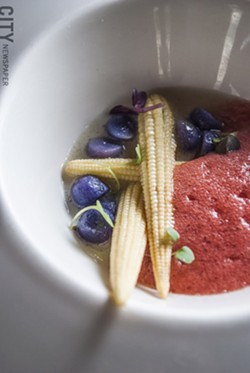 Summer Corn Soup: tomato lavender cloud, purple Peruvian potatoes, sweet baby corn - PHOTO BY MARK CHAMBERLIN