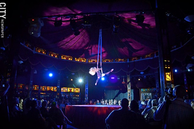 The Beautiful Heather performs an aerial feat as part of Cirque du Fringe, taking place in the Spiegeltent throughout the Rochester Fringe Festival.
