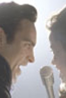 The man in black and his cheerleader:
    Joaquin Phoenix and Reese Witherspoon in "Walk the Line."