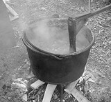 PHOTO BY ADAM WILCOX - The well-tempered turn and constant stir: the kettle that cooked the apple butter in Hilton.