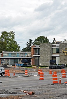 Three professional office buildings on Mount Hope and Elmwood avenues will be torn down next month for the College Town project.