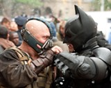 Tom Hardy as Bane and Christian Bale as Batman in "The Dark Knight Rises." PHOTO COURTESY WARNER BROS. PICTURES