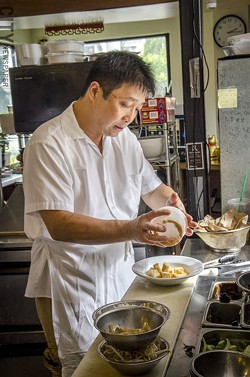 Tony Ko focuses on simple Chinese street food, using fresh ingredients, at his restaurant Han Noodle Bar. - PHOTO BY MARK CHAMBERLIN