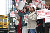 PHOTO BY KRESTIA DEGEORGE - Tragedy waiting to happen: Members of the Federation of Social Workers protest the county budget proposal, among other things, last week in downtown Rochester.