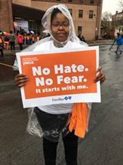 A participant in the YWCA's Stand Against Racism march. - PHOTO BY JAMES BROWN, WXXI