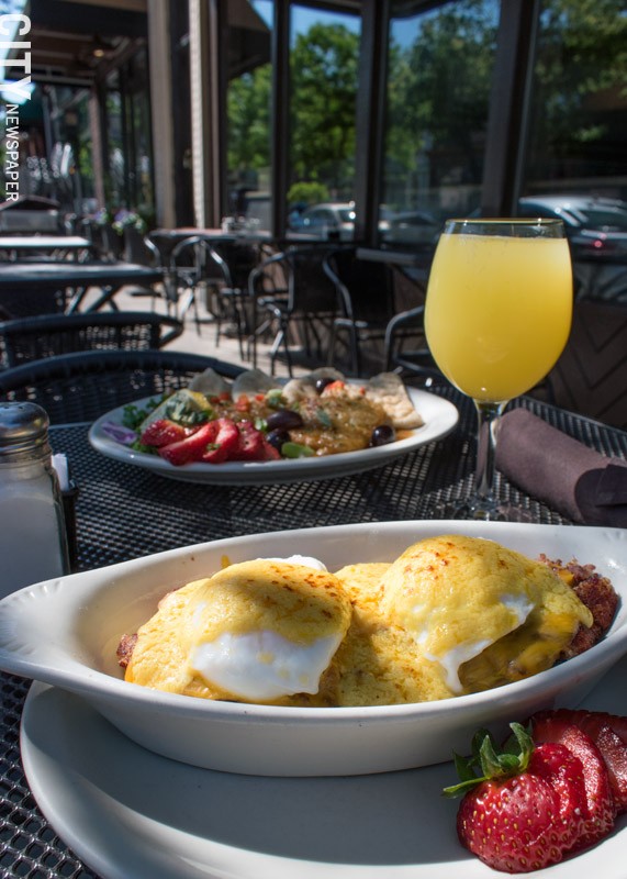 The house-made hash benedict and mimosa at Jines. - PHOTO BY RENÉE HEININGER