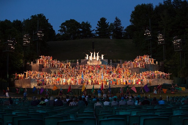 The Pageant began in 1937 as a production lit by car headlights; now it has a seven-tier steel stage built into the side of the hill, state-of-the-art special effects that simulate lightning and fire, 12 theatrical lighting and sound towers rising 50 feet into the air, and a completely volunteer cast of 770 people playing more - than 1,200 roles. - PHOTO COURTESY MATT BARR, HILL CUMORAH PAGEANT