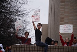 Monday morning, students at School of the Arts protested district plans to layoff teachers. - PHOTO BY GINO FANELLI