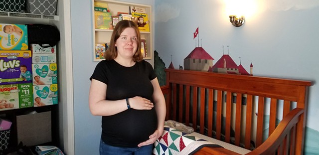 CITY freelance writer Kathy Laluk at home in the nursery awaiting her son. She is due to give birth in late April. - PHOTO COURTESY OF KATHY LALUK