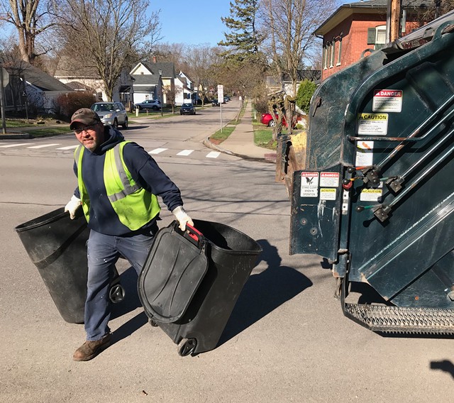Todd Shuryn, of the Fairport Department of Public Works, makes the rounds in the village. - PHOTO BY DAVID ANDREATTA