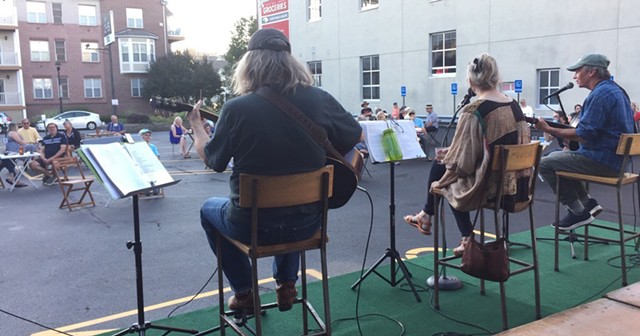 The Spring Chickens, performing outside The Little Theatre, from left to right: Steve Piper, Connie Deming and Scott Regan. - PHOTO BY JEFF SPEVAK