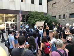 Protesters marched to the DA’s office and called for Doorley’s resignation. - CREDIT NOELLE E. C. EVANS | WXXI NEWS