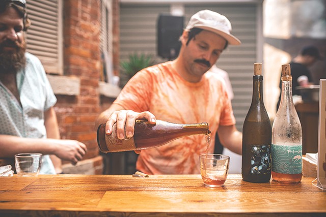 Brandon Opalich pours curated wine selections at an Aldaskeller Wine Co. pop-up tasting event in 2019. - PHOTO BY JASON CAMPBELL