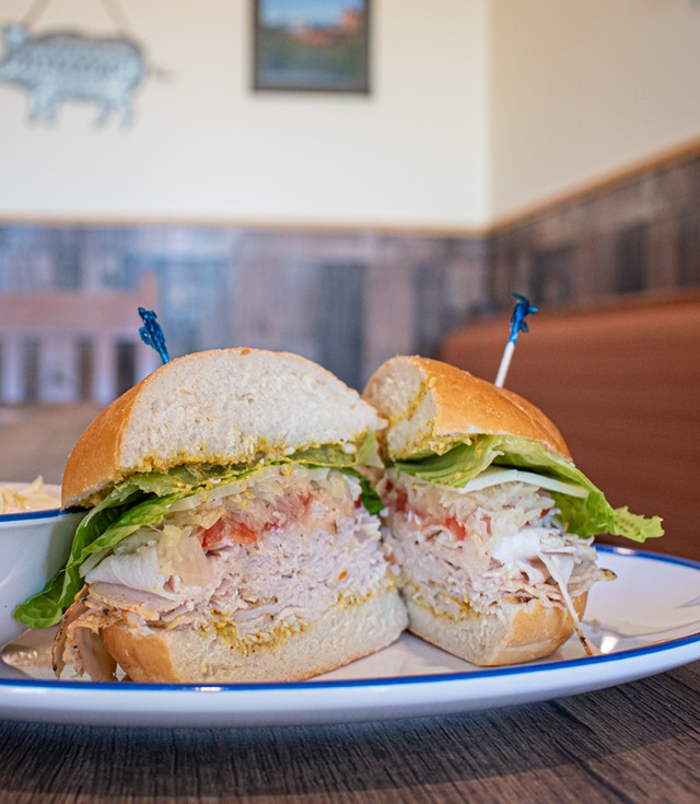 Roasted turkey on a hard roll with sauerkraut. - PHOTO BY JACOB WALSH