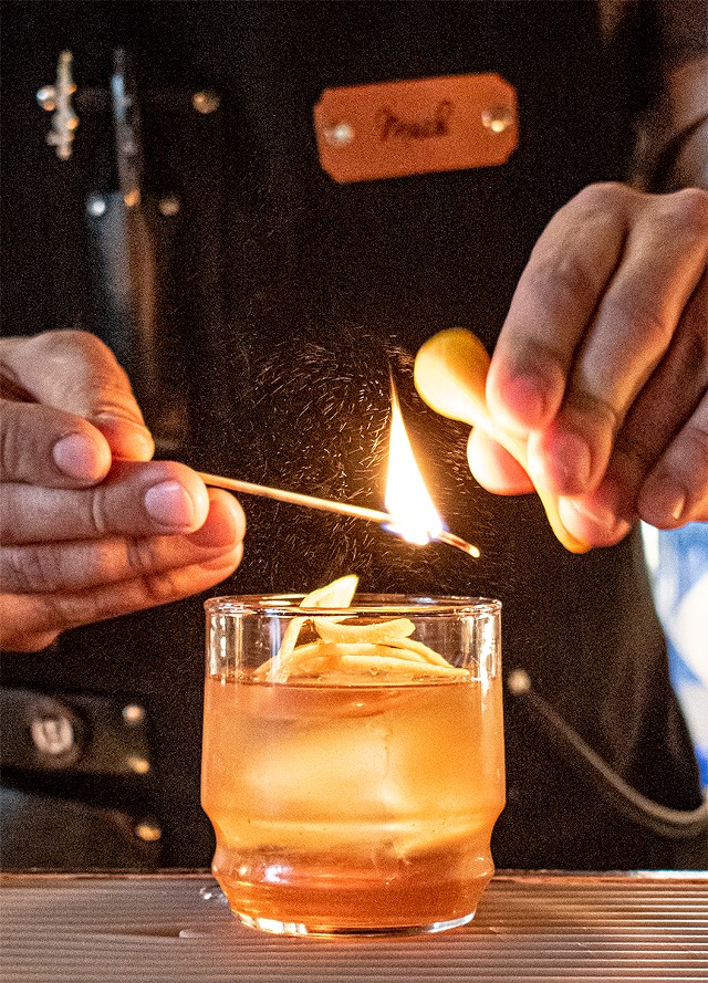 The bright aroma of a burned orange peel provides the finishing touch to "The Iron Sickle." - PHOTO BY JACOB WALSH