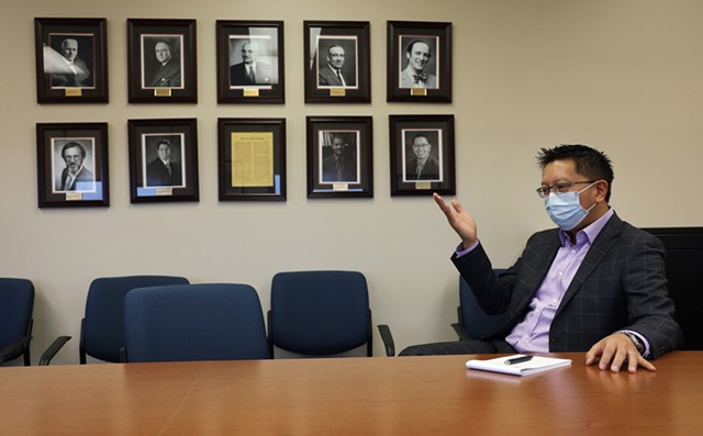 Monroe County Public Health Commissioner Dr. Michael Mendoza speaks from a conference room near his office at the county Health Department. - PHOTO BY MAX SCHULTE