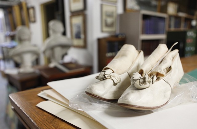 Shoes made by a Rochester cobbler for his bride on their wedding day are part of the Rochester Historical Society's collection. - PHOTO BY MAX SCHULTE
