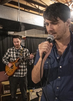 Guitarist Mark Bamann (left) at a FRAN rehearsal with Jon Lewis. - PHOTO BY JACOB WALSH
