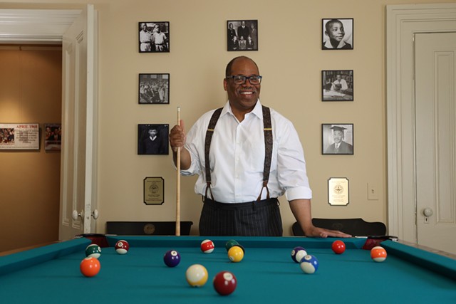 The pool table was in the basement of the main dormitory at Crozer Theological Seminary, where Martin Luther King Jr. attended from 1948 to 1951 and is said to have been introduced to billiards. It now sits in Van White's law office on Grove Place. - PHOTO BY MAX SCHULTE