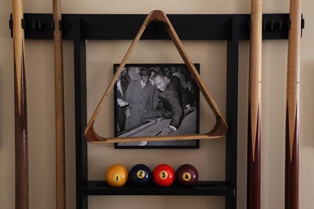 Martin Luther King Jr.'s use of pool to connect with people and advance the struggle for civil rights is well documented. The best known image of King playing pool was taking in 1966 in Chicago during an "anti-slum campaign." The photo is among the paraphernalia in Van White's room dedicated to "King's table." - PHOTO BY MAX SCHULTE