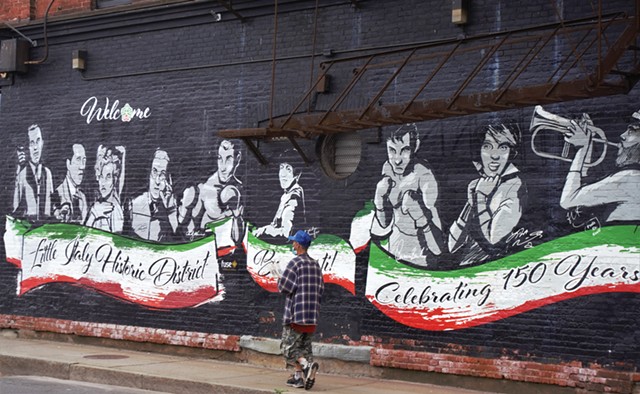 The Little Italy mural on the Flatiron Building contains Italian-American, and not-so-Rochesterian, icons like Liza Minelli, Rocky Marciano, and Frank Sinatra. - PHOTO BY GINO FANELLI