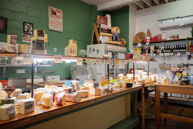 The cheese counter at VM Giordano Inc. — European Cheese Shop. - PHOTO BY JACOB WALSH
