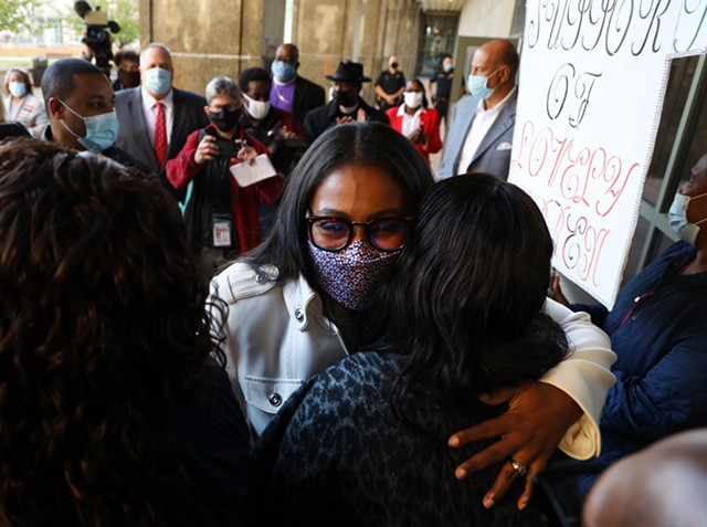 Mayor Lovely Warren exited the courthouse to a throng of supporters after her arraignment on felony charges related to alleged campaign finance violations on Oct. 5, 2020. - PHOTO BY MAX SCHULTE