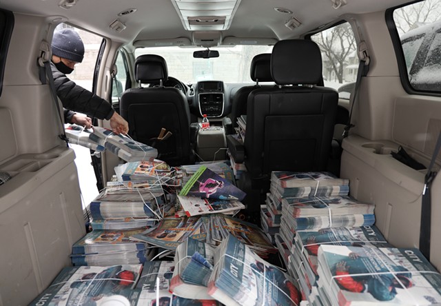 CITY Editor David Andreatta loaded his minivan with some 5,000 copies of the magazine. The exercise gave him and other CITY staffers a chance to meet small-business owners who host CITY newsstands and their customers. - PHOTO BY MAX SCHULTE