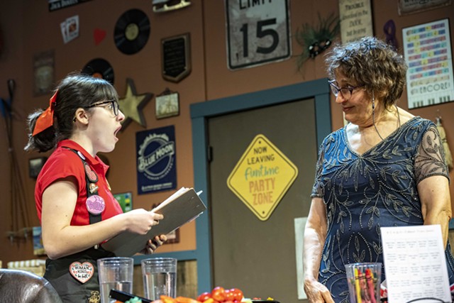 Natalia Stornello, left, bring her character's eager perfectionism to life in JCC's production of "Tracy Jones." Here she chats with co-star Vicki Casarett. - PHOTO BY STEVE LEVINSON