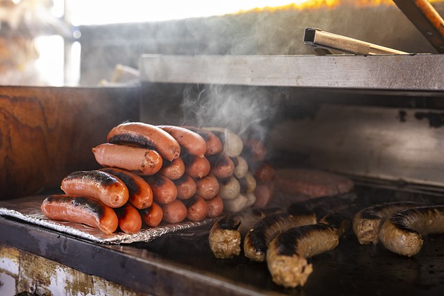 George Haddad's menu includes the typical hot dog vendor fare. But he insists that his Polish kielbasa is the best he's ever had. - PHOTO BY LAUREN PETRACCA
