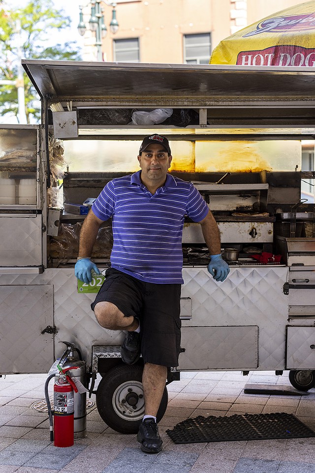 Charlie Abiad's cart is officially named "Joe & Charlie's Grill." The "Joe" is a nod to his late father, who used to help his son by fetching drinks from the cooler for customers. - PHOTO BY LAUREN PETRACCA