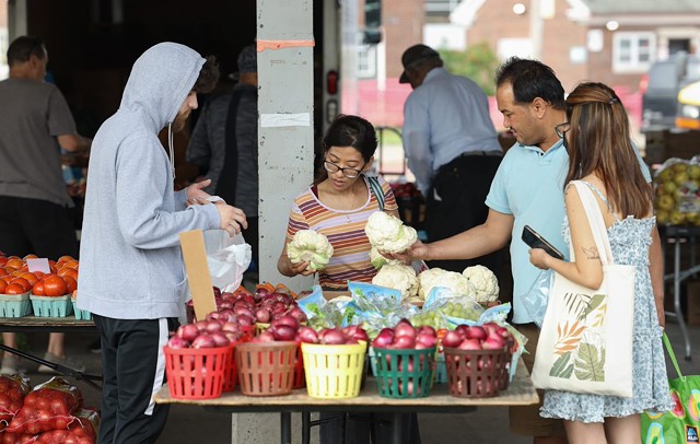 Shoppers at the Rochester Public Market. - PHOTO BY MAX SCHULTE