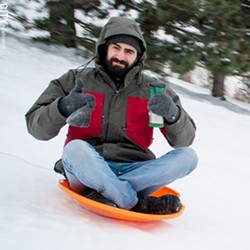 A weird dude on a sled. - FILE PHOTO