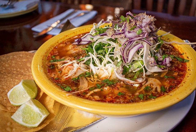 The pozole rojo, a pork and pepper stew with chewy hominy maize and fresh vegetables and herbs. - PHOTO BY JACOB WALSH