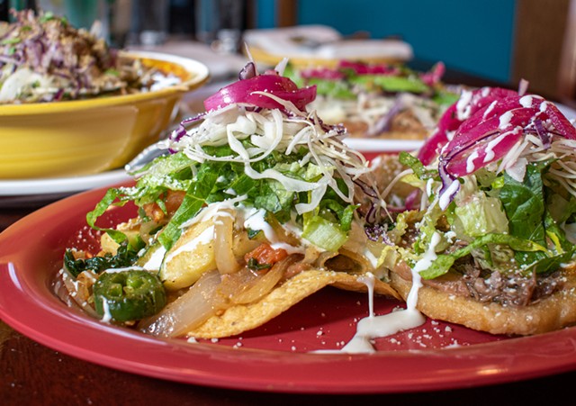 The Colima combo on the menu at Tavo's Antojitos y Tequila includes two crispy flautas de pollo, and a tostada and sope, each topped with pollo, carnitas, or barbacoa. - PHOTO BY JACOB WALSH